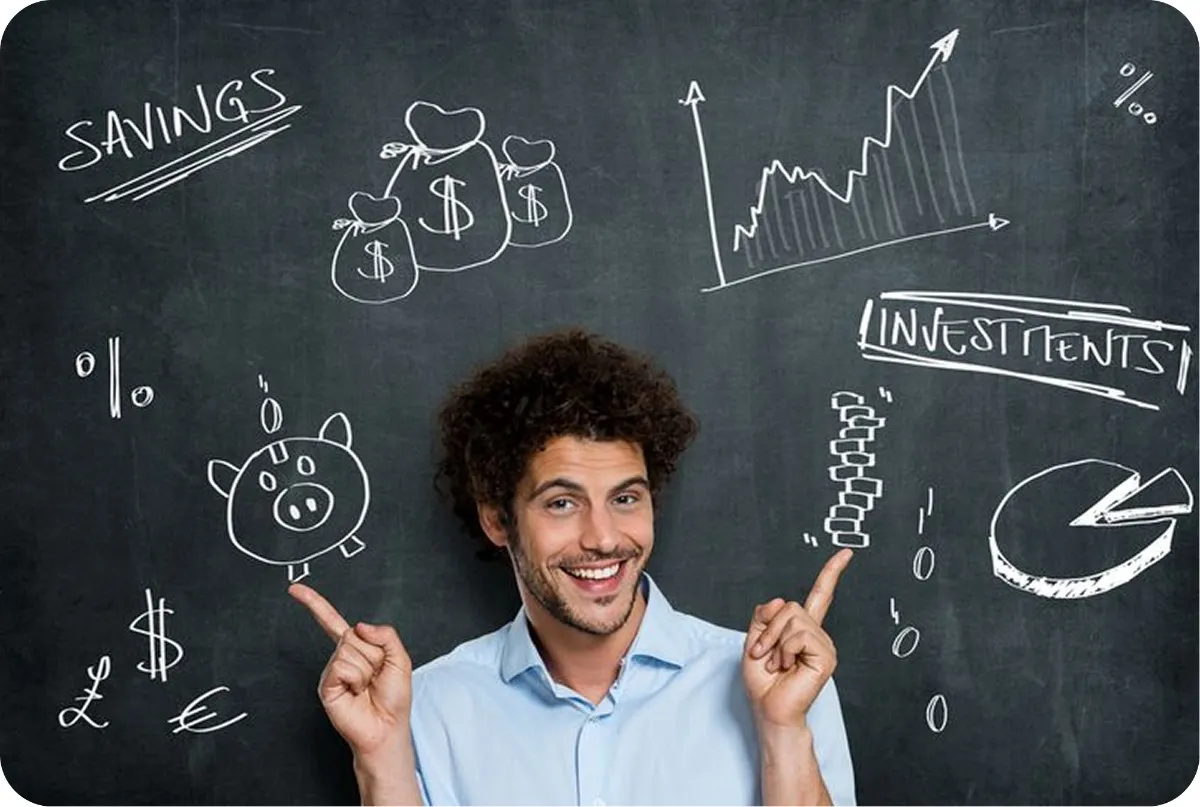 Young man pointing to chalkboard drawings of savings, investments, and growth charts, illustrating Oratrics' best financial literacy program for kids